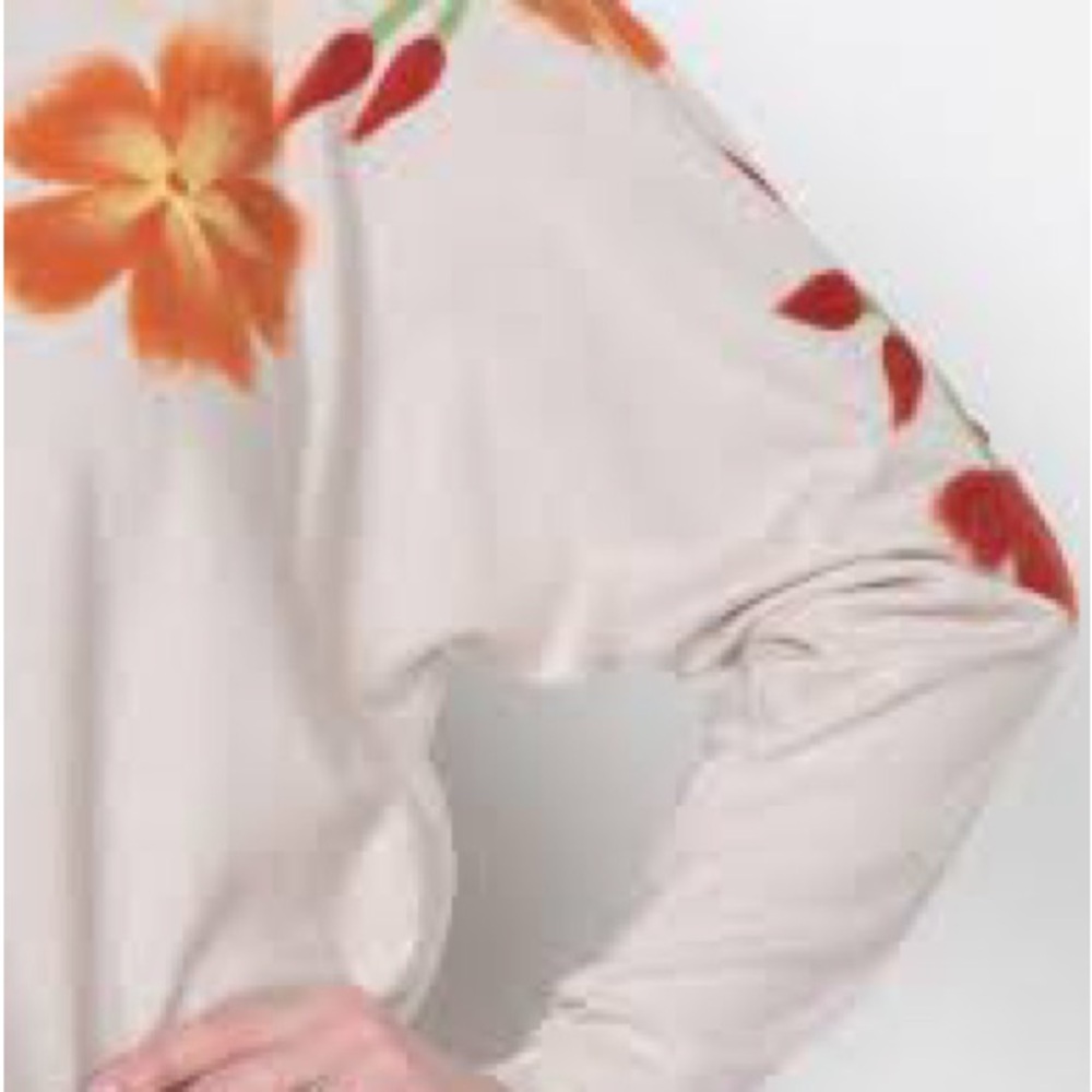 Aaeda Beige Long Sleeve sweater with intricate raised flower design.
